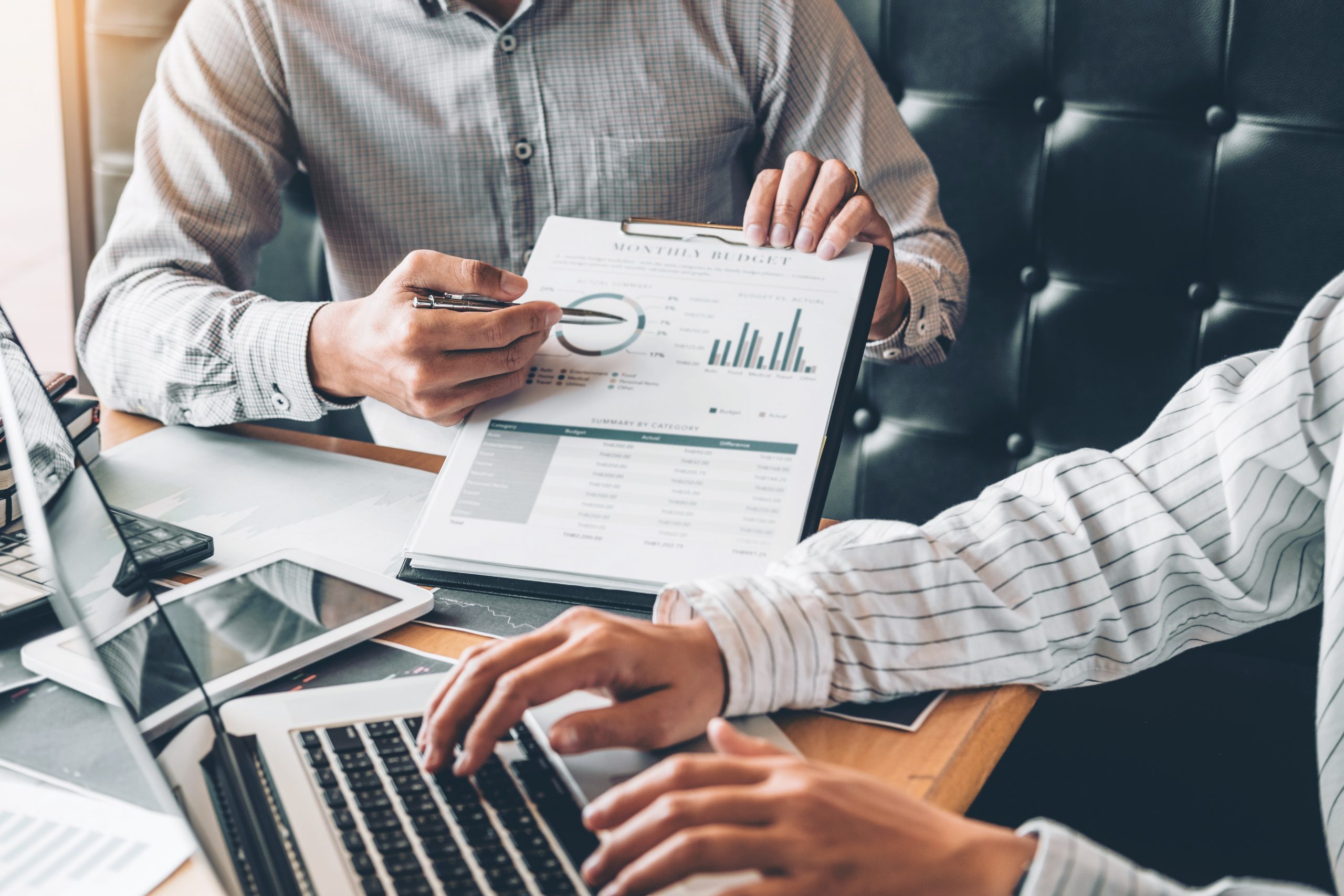 co-working-business-team-consulting-meeting-planning-with-digital-tablet-strategy-analysis-scaled