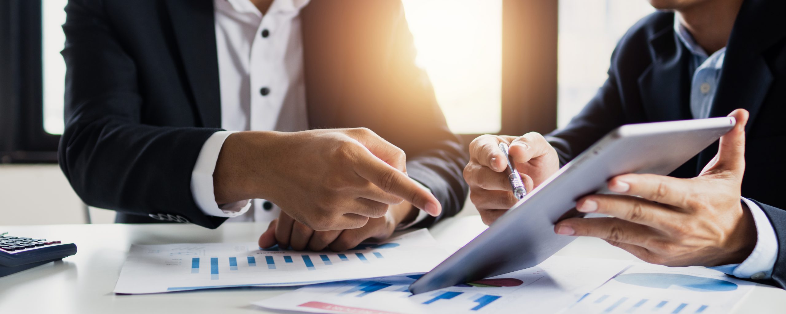 legal-businessman-advisor-two-business-people-talking-planning-analyze-investment-marketing-tablet-office-scaled